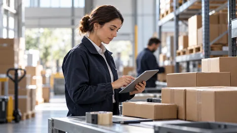 Photographic concept of a warehouse coordinator checking dispatch information on a tablet
